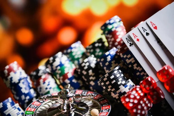 Mobile phone showing Free Bet Blackjack interface with betting controls and dealer video feed